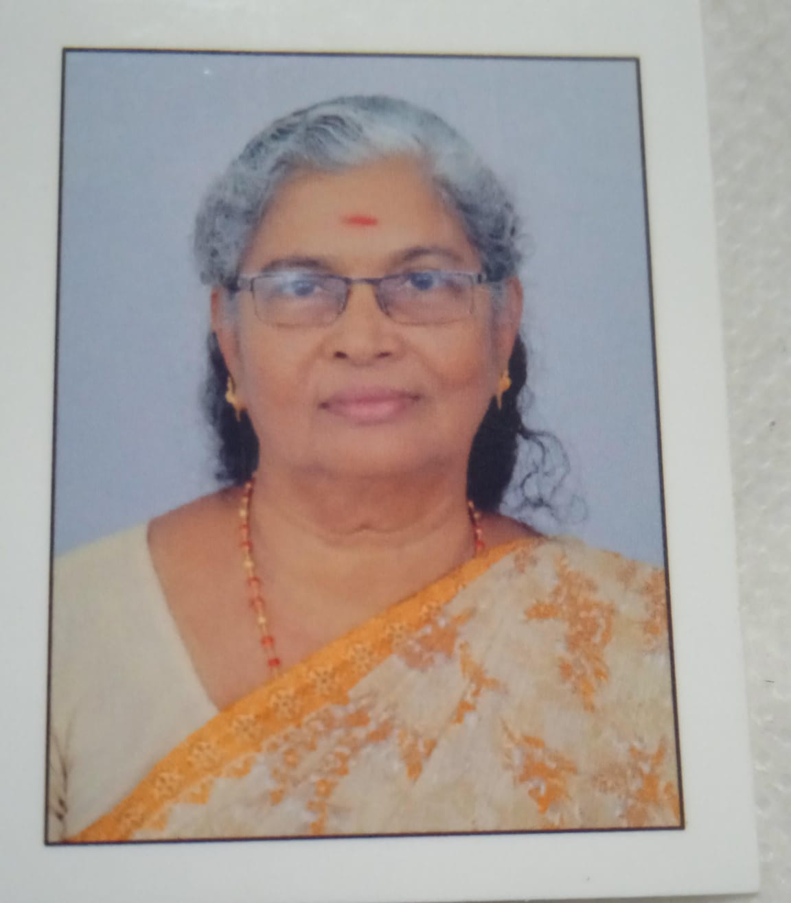 G. KOMALAM